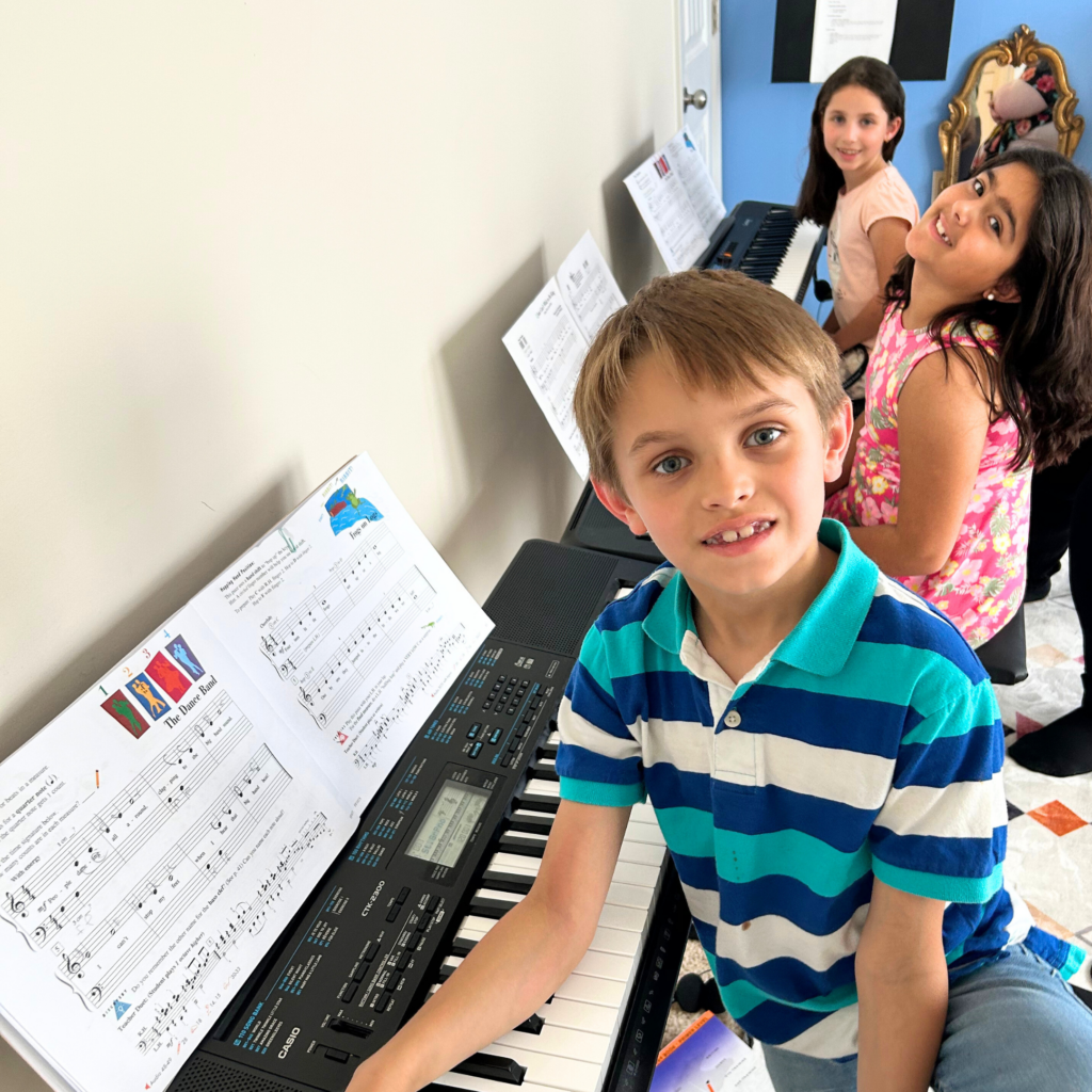 Group Music Classes in Piano, Voice, and Guitar that offer fun, social, engaging music education in Apex, NC for affordable prices - a great value!